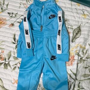 Nike Kids' Light Blue Tracksuit with Black Accents